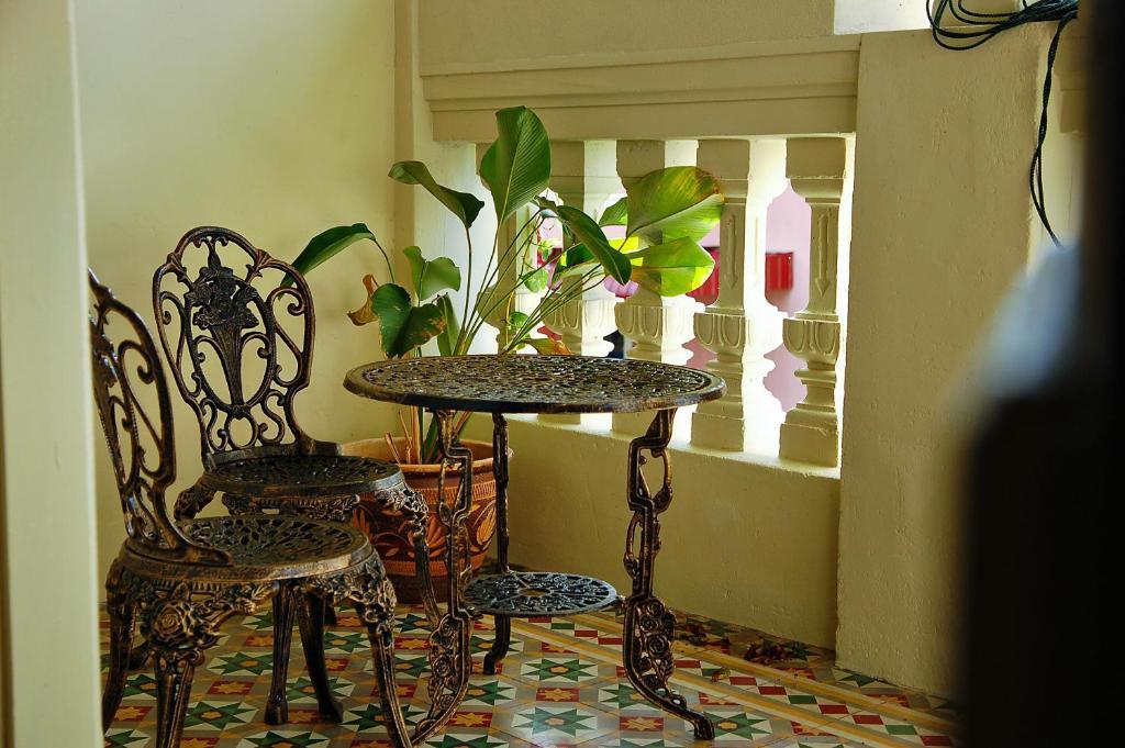 Palanquinn Heritage Suites George Town Kamer foto